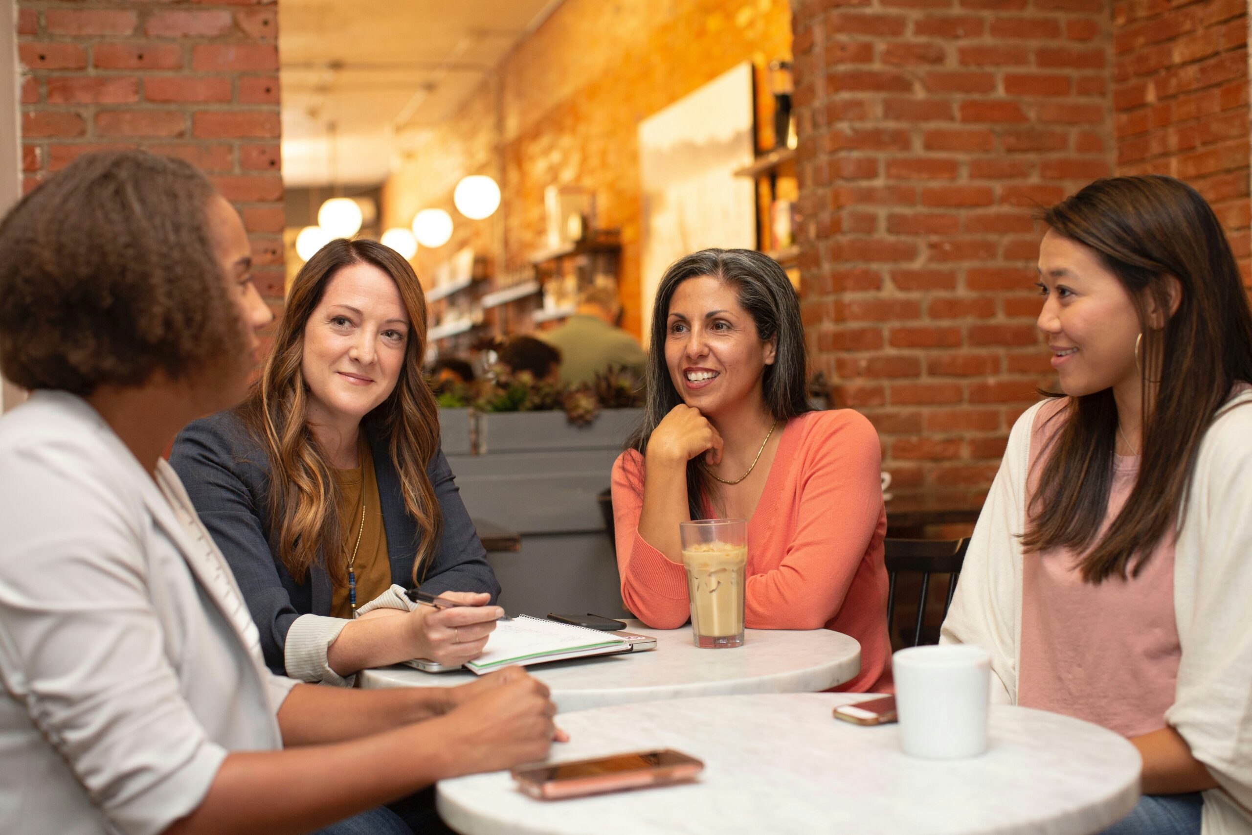Small group of professionals collaborating during a casual business meeting.